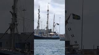 Amazing sailboat!  Crew Climbing Masts!