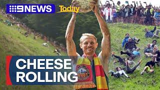 Aussie wins UK annual cheese rolling race | 9 News Australia