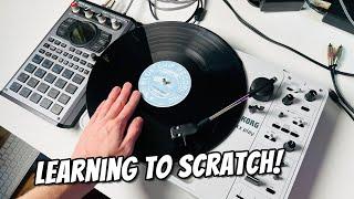 Learning to scratch records with the Korg Handytraxx Play