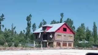 Kashmir News Trust: Indian Army blasting the house during an encounter in Kashmir.....