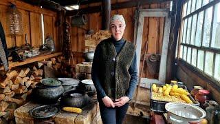 The hard life of a girl in a remote village in Ukraine. Cooking borscht in the oven