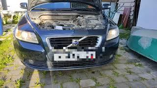 Снятие и установка передней фары. Замена ламп ближнего света. Volvo S40