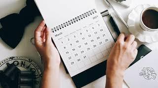 A person writing on calendar (free footage)