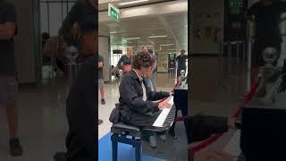 Playing Still Dre at the rome airport on a public piano!