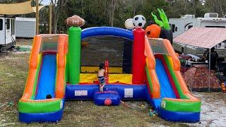 Unboxing and setting up our bounce house with double slides