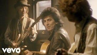 The Traveling Wilburys - End Of The Line (Official Video)