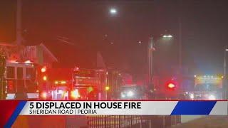 Peoria house fire displaces family of five