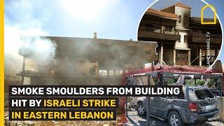 SMOKE SMOULDERS FROM BUILDING HIT BY ISRAELI STRIKE IN EASTERN LEBANON