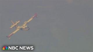 Firefighting aircraft hit by drone