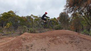 Steep jump on the newly updated Evolution Jump trail - side view - Stromlo MTB Mountain bike