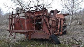 east of Chernobyl and the Pripyat river: Krasnoje (Красне) village & radioactive combine harvesters