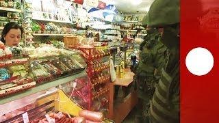 Video: Masked soldiers in Crimea queue up for sausages at grocery store