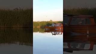 Lovely old wooden boat on the river thurne