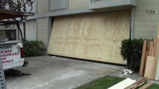 A wood one piece garage door