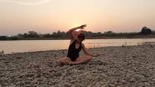 Yoga in bikini in a beutiful place