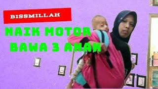 Caraku menggendong bayi sambil naik motor tetap aman