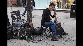 Violin bow on a Guitar  Amazing Street Performance - Manchester