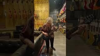 Grandma shreds inside a Guitar Center with Lit