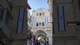 Israeli flags and a menorah on a Jewish house in the Muslim Quarter in the Old City of Jerusalem