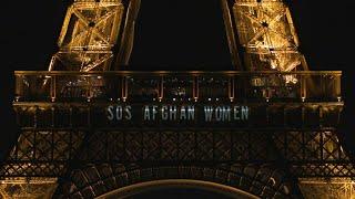 'SOS Afghan Women' beamed on Eiffel Tower on International Women's Day | AFP