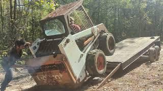 loading a rear heavy skid steer