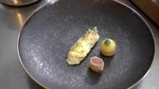 Preparation of a dish with pigeon at the 2 Michelin De Zwethheul in The Netherlands