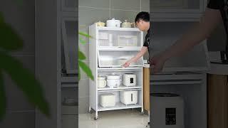 This shelf is really practical. It can store the pots and appliances that are often used