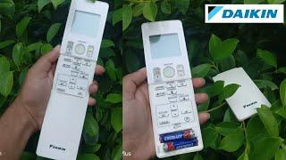 How to remove cover of diakin AC remote control and inserting, changing batteries.