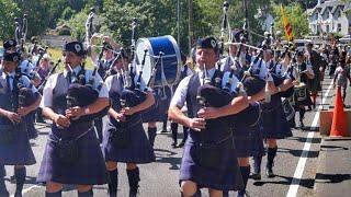 Badenoch & Strathspey Pipe Band Leading the Clan March during 2013 Lochearnhead Highland Games