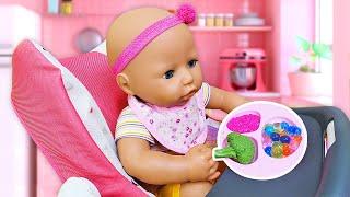 Baby Annabell doll goes shopping and chooses a new plate and a pacifier for the baby.