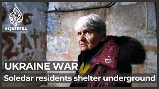 Ukraine war: Soledar residents take shelter as attacks continue