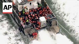 Migrants arrive in English port of Dover after being rescued in English Channel