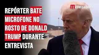 Repórter bate microfone no rosto de Donald Trump durante entrevista