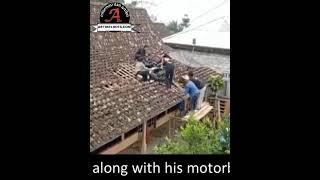 Viral, this motorcycle jumped and got stuck on the tiled roofs of residents houses