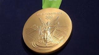 Олтин медалнинг нархи канча