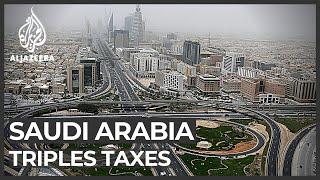 Saudi Arabia slashes budget and increases tax