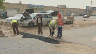 Libya: Misrata residents mobilize to fill 'potholes'