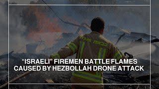 “Israeli” firemen battle flames caused by Hezbollah drone attack