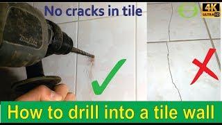 How to drill into a tile wall without cracking it