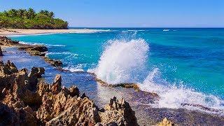 Splashing Waves All Day on Playa Encuentro - Refreshing and Relaxing on a Hot Summer Beach