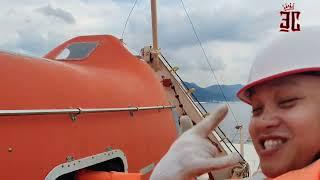 Launching and maneuvering of lifeboat at anchorage area in Hiroshima Japan