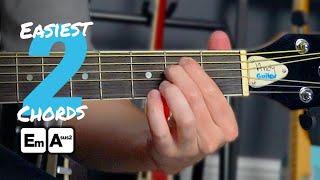 Beginners First Guitar Lesson - The EASIEST 2 Chords On Guitar