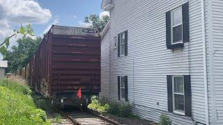 Freight train feet from houses! Mass Central Railroad