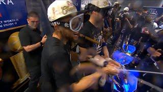 Steph Curry and Warriors locker room celebration after winning the title