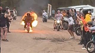 Daring Guy on his mini-bike jumps into lake while on fire *Incredible Stunt* || WooGlobe