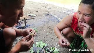 Primitive Food: Survival skills Use bow arrow shoot fish in river - Eat delicious fish