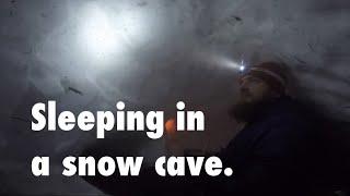 Sleeping in a snow cave in Russian forest.