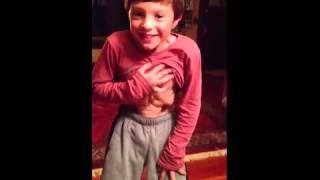 Boy flexes his weird abs