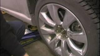 How to Change a Flat Tire : How to Remove a Car Tire