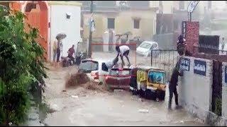 Haldwani: Cars, auto get swept away in floods